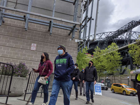 Seattle, WA USA - circa May 2021: View of separated lines for people to queue up for health screenings before getting the covid 19 vaccine.のeditorial素材