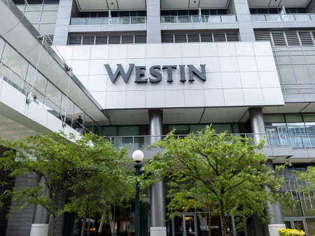 Bellevue, WA USA - circa June 2021: Low angle view of the entrance to the Westin hotel in downtown Bellevue near the mall.のeditorial素材