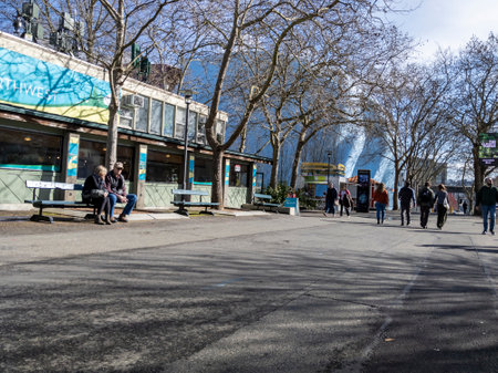 Seattle, WA USA - circa April 2022: View of people walking around and enjoying a sunny day near the Seattle Center area in the downtown district.のeditorial素材