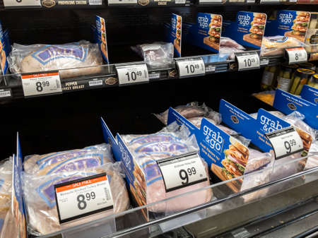 Kirkland, WA USA - circa September 2021: Top down, angled view of a variety of sandwich lunch meat for sale inside a Safeway grocery store.のeditorial素材