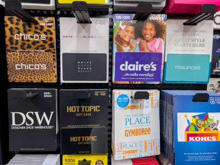 Woodinville, WA USA - circa May 2022: Angled view of a variety of gift cards for sale inside a Haggen grocery store.のeditorial素材