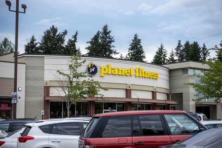 Mill Creek, WA USA - circa June 2022: Exterior view of a Planet Fitness gym on a cloudy day.のeditorial素材
