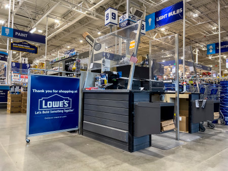Everett, WA USA - circa July 2022: Angled view of a checkout counter inside a Lowes Home Improvement...