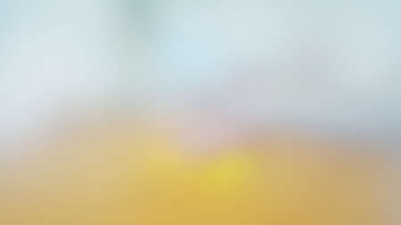 light blue-yellow color blur background at 16:9 ratio