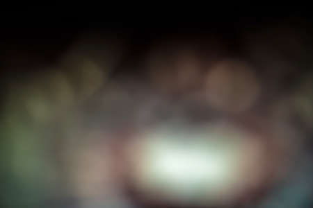 dark brown abstract background with sphere-like shape
