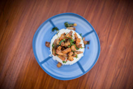 Thai food, Khao Kaprao Hmoo Krob, crispy pork fried with sweet brasil cover the steam riceの写真素材