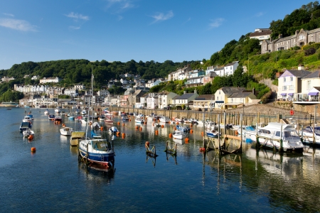 Looe Cornwall boats on river on beautiful dayの写真素材