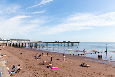 Tourists Teignmouth beach Devon Englandのeditorial素材