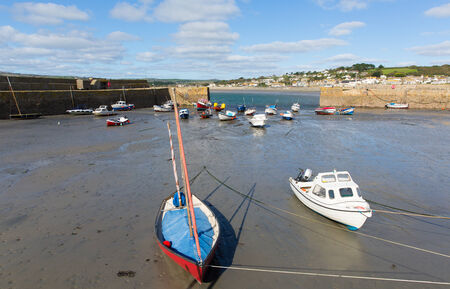 Boats in St Michaels Mount Harbour Cornwall England at low tideのeditorial素材