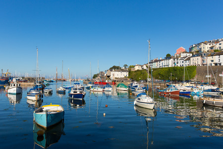 Brixham harbour Devon England with boats on a calm day with blue sky during the heatwave of Summer 2013のeditorial素材