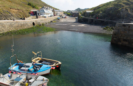 Looking towards Mullion Cove Cornwall UK from the harbour wallの写真素材