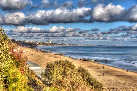 Branksome beach Poole Dorset England UK with cloudscape near to Bournemouth like painting in vivid...