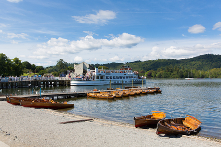 Boats Bowness on Windermere Lake District Cumbria UK in summer sun with blue skyのeditorial素材