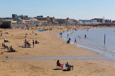 Beautiful summer sunshine and warm weather drew visitors to the seaside at Weston-super-Mare, Somerset on Saturday 8th August 2015のeditorial素材