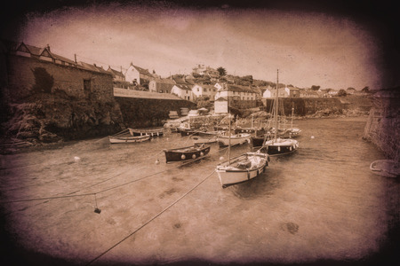 Coverack harbour Cornwall England UK coastal fishing village east of the Lizard Peninsula vintage effectの写真素材