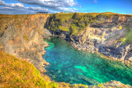 Beautiful Cornwall coast with turquoise blue sea Pepper Cove between Treyarnon and Porthcothan in...