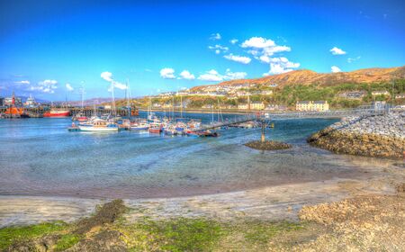 Mallaig port Scottish Highlands Lochaber Scotland UK with boats in harbour colourful hdr