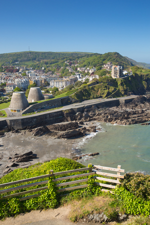 Ilfracombe North Devon coast tourist destination in summer with blue skyの写真素材