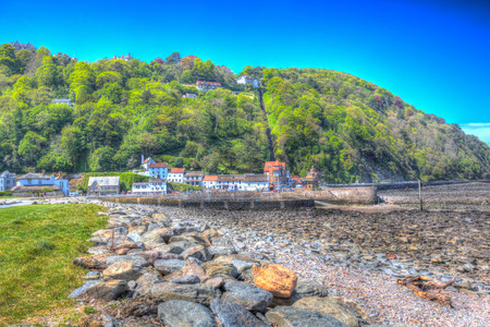 Lynmouth harbour Devon England UK with hillside railway in colourful hdrの写真素材