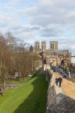 YORK, ENGLAND, UK-FEBRUARY 24TH 2017: Beautiful sunshine and fine weather was enjoyed by visitors walking the city walls in York, North Yorkshire on Friday 24th February 2017のeditorial素材