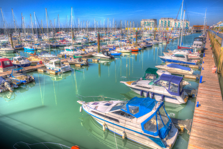 Brighton marina boats and yachts East Sussex England UK near Eastbourne in bright colourful HDRのeditorial素材