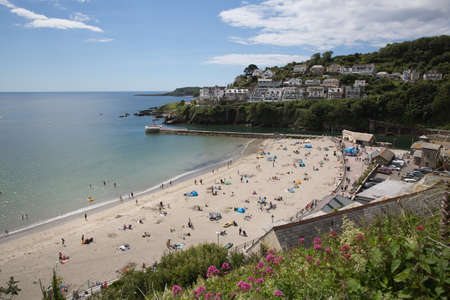 Looe Cornwall fine weather attracted visitors back to the beach for the summer sunshine on Saturday 11th July 2020のeditorial素材
