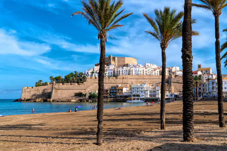 Peniscola castle with palm trees Costa del Azahar Spainのeditorial素材