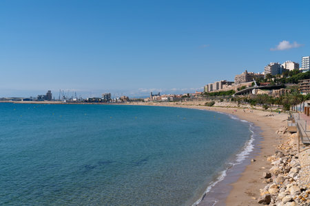 Tarragona Spain Platja del Miracle beach with blue Mediterranean seaの写真素材