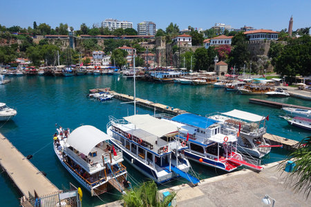 Antalya Marina Turkey historic old town area known as Kaleici with boats and yachts in the harbourの写真素材