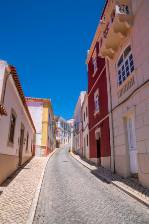 Silves Algarve southern Portugal a town street with houses and buildingsの写真素材