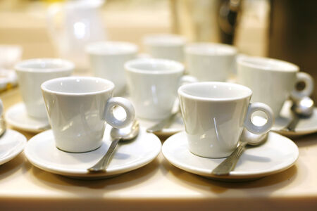 coffee cups and saucers at an eventの写真素材