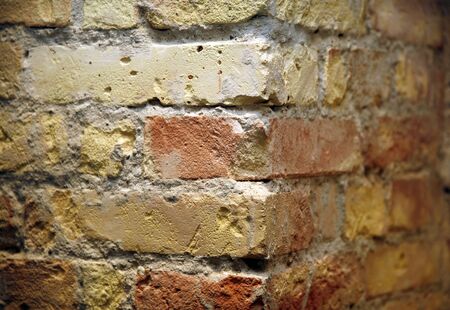 Grunge brick wall on corner as a background