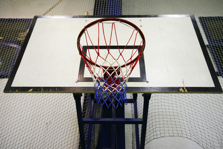 Basketball hoop in the  high school gym
