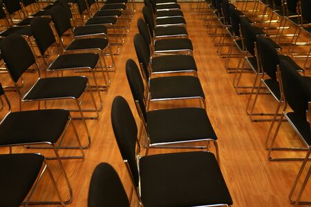 Rows of empty chairs in a seminar hallの写真素材