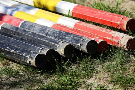 Barriers on the ground for jumping horses as a backgroundの写真素材