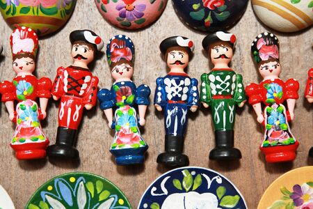 Handmade toys dolls puppets in traditional hungarian symbolic artistic dressの写真素材