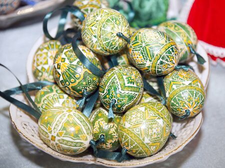BUDAPEST, HUNGARY - MARCH 4, 2016: Handmade colorful easter eggs for sale in a basket as a festive symbol at Budapest Market Hallのeditorial素材