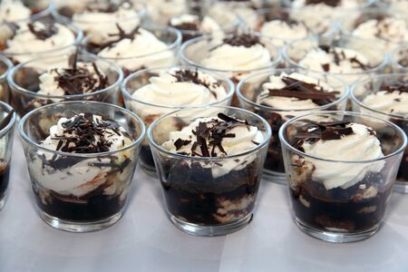 Bowl of whipped chocolate cream in row