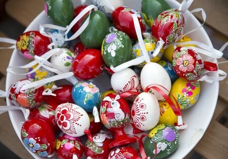 Budapest, Hungary - Febr. 12, 2017: Handmade colorful easter eggs for sale in a basket as a festive symbol at Budapest Mangalica Festivalのeditorial素材