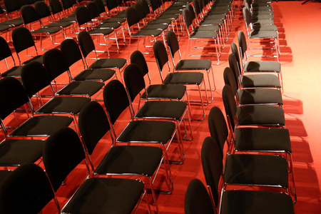 Rows of empty seats of an empty conference hall