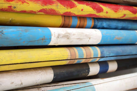 Stack of barriers for jumping horses as a background