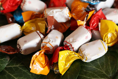 Pile of famous hungarian christmas fondant in christmas market as a background. Group of parlor candies for sale in natural green backgroundの写真素材