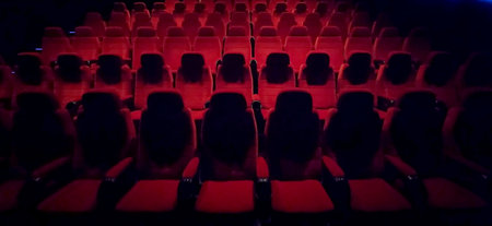 Empty cinema hall with red seats. Interior of modern movie theater. Cinema movie theater concept...