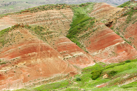 Colorful spectacular panoramic view of rainbow mountains hills in Georgia. Striped desert of Mravaltskaro mountains at the border of Georgia and Azerbaijan. Famous tourist place at Gareja, Kakhetiの写真素材