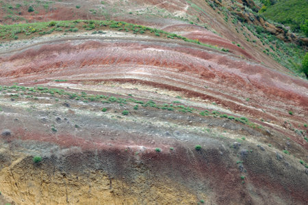 Colorful spectacular panoramic view of rainbow mountains hills in Georgia. Striped desert of Mravaltskaro mountains at the border of Georgia and Azerbaijan. Famous tourist place at Gareja, Kakhetiの写真素材