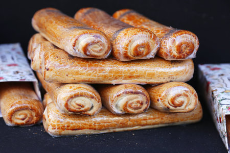 Homemade poppy seed rolls aka bejgli as a christmas gift. Christmas gastronomy background at...
