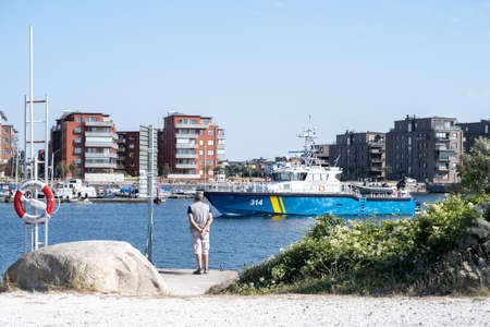 Malmo, Sweden - August 14, 2020: Swedish coast guard boat in the Cementa harborのeditorial素材