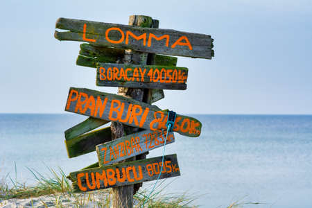 A distance sign at Lomma Beach, Scania county, Sweden