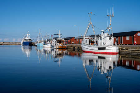 June 26, 2021 - Boda Harbour: Fishing boats in beautiful sunset light. These fine days have brought a significant rise in tourism activities on the island of Olandのeditorial素材