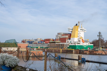 Kiel, Germany - February 22, 2022: A maritime vessel is entering the Kiel Canal from the Baltic Sea. The Kiel Canal links the Baltic Sea with the North Seaのeditorial素材